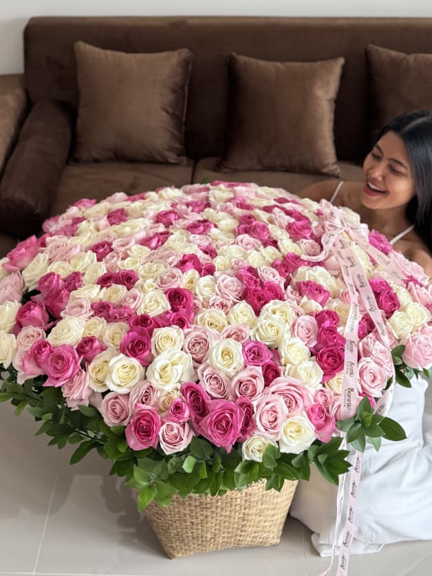 A monumental bouquet of 301 Holland roses in candy, white, and pink